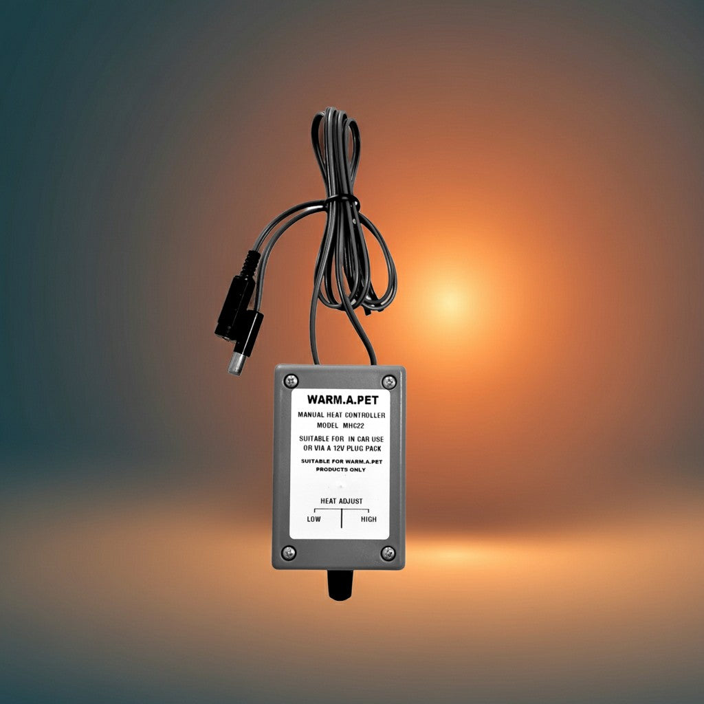 Warm.A.Pet-In-Car-Manual-Heat-Controller on a gradient background
