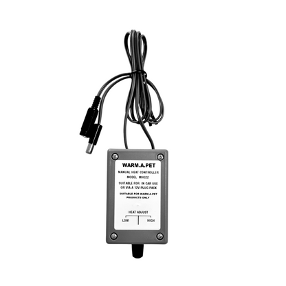 Warm.A.Pet In Car Manual Heat Controller, with a black and gray color scheme, including a power switch and a dial for heat adjustment, with an attached power cord.