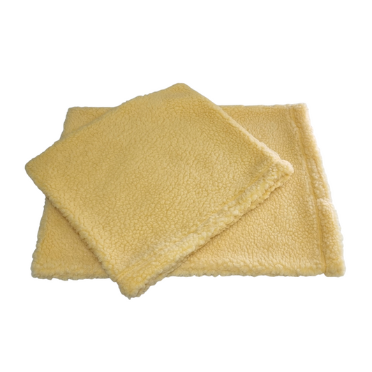 Two beige Warm.A.Pet Sherpa Covers on a white background