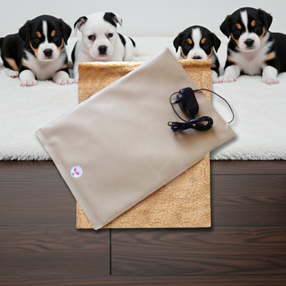 Warm.A.Pet heat pad with power cord on a wooden floor, surrounded by puppies.