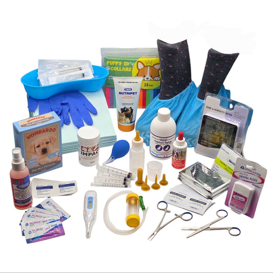 Whelping Kit 2 contains a collection of supplies for pet whelping, including bottles, syringes, medical instruments, and hygiene items.