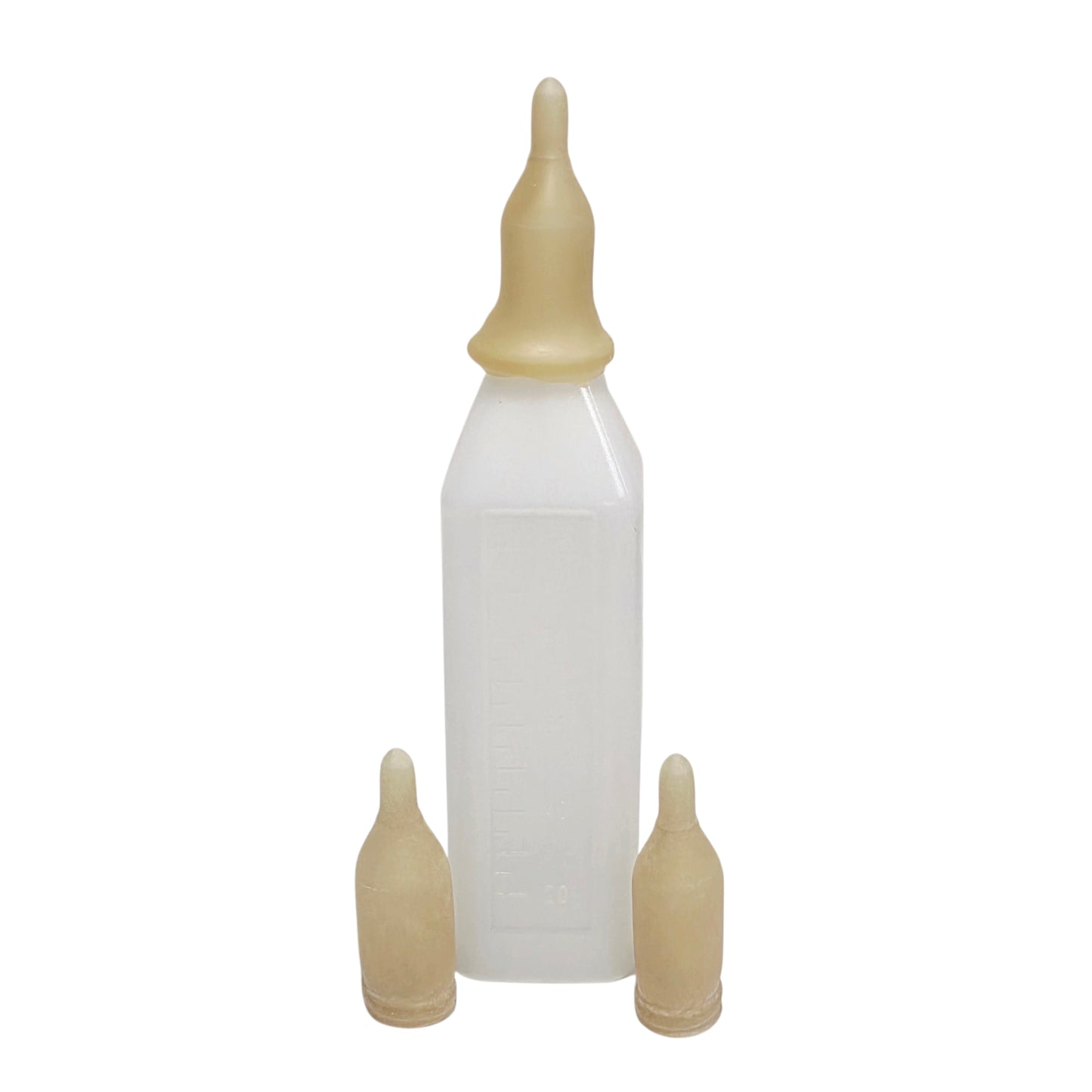 Wombaroo SD Teat on a bottle with two teats in front on a white background