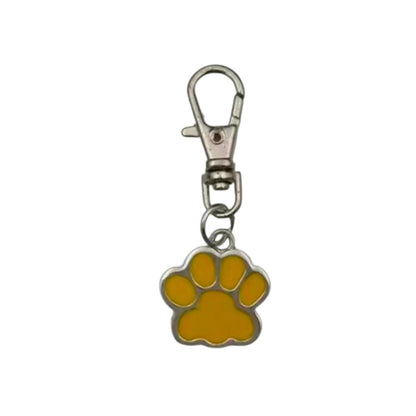 Yellow paw print keychain with a metal clasp on a white background