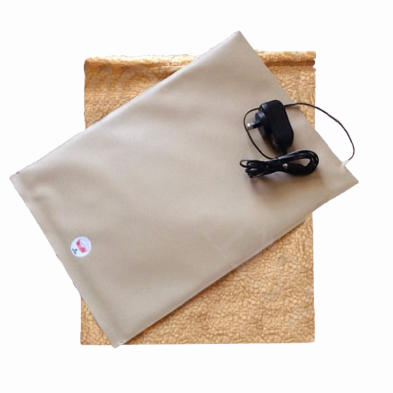 A Warm.A.Pet heating pad with a control switch, and a sherpa slip-cover. 