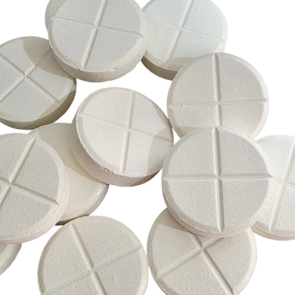 Worming tablets with a grid pattern on a white background