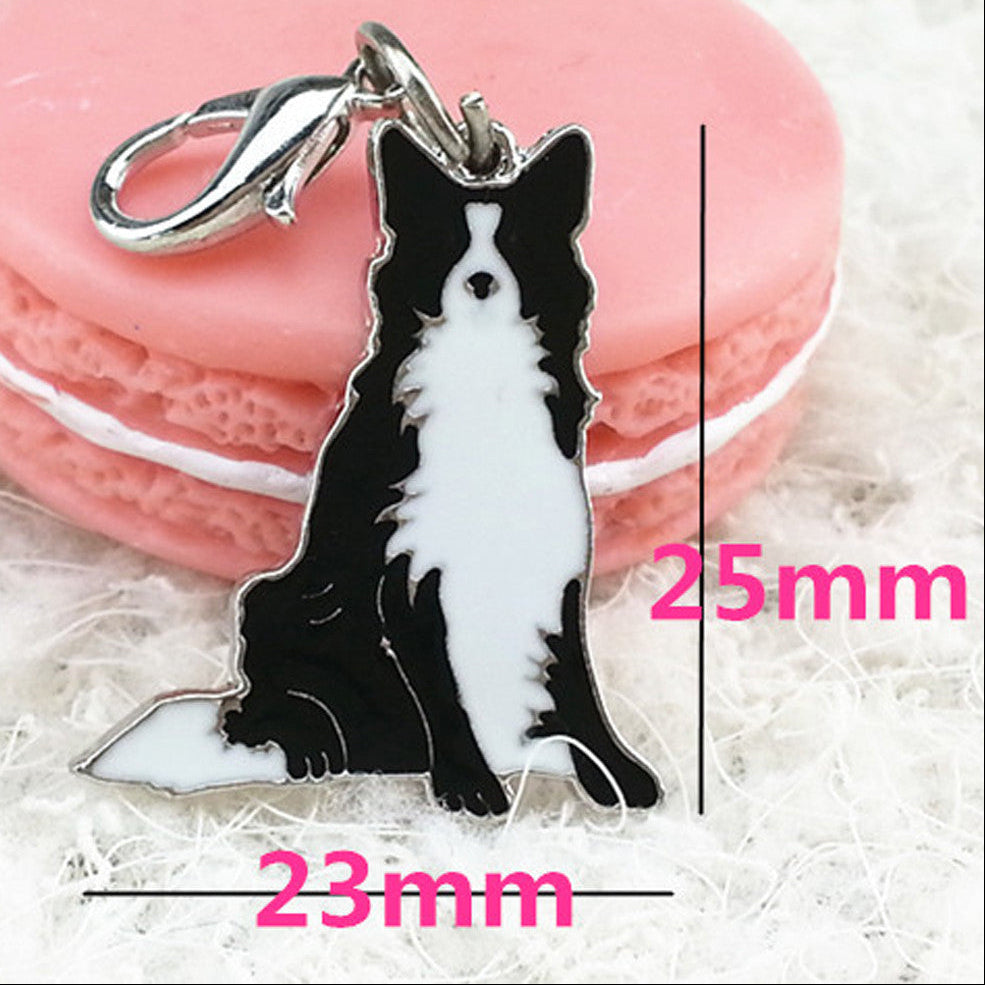 Border Collie Key Tag on fluffy white background with pink