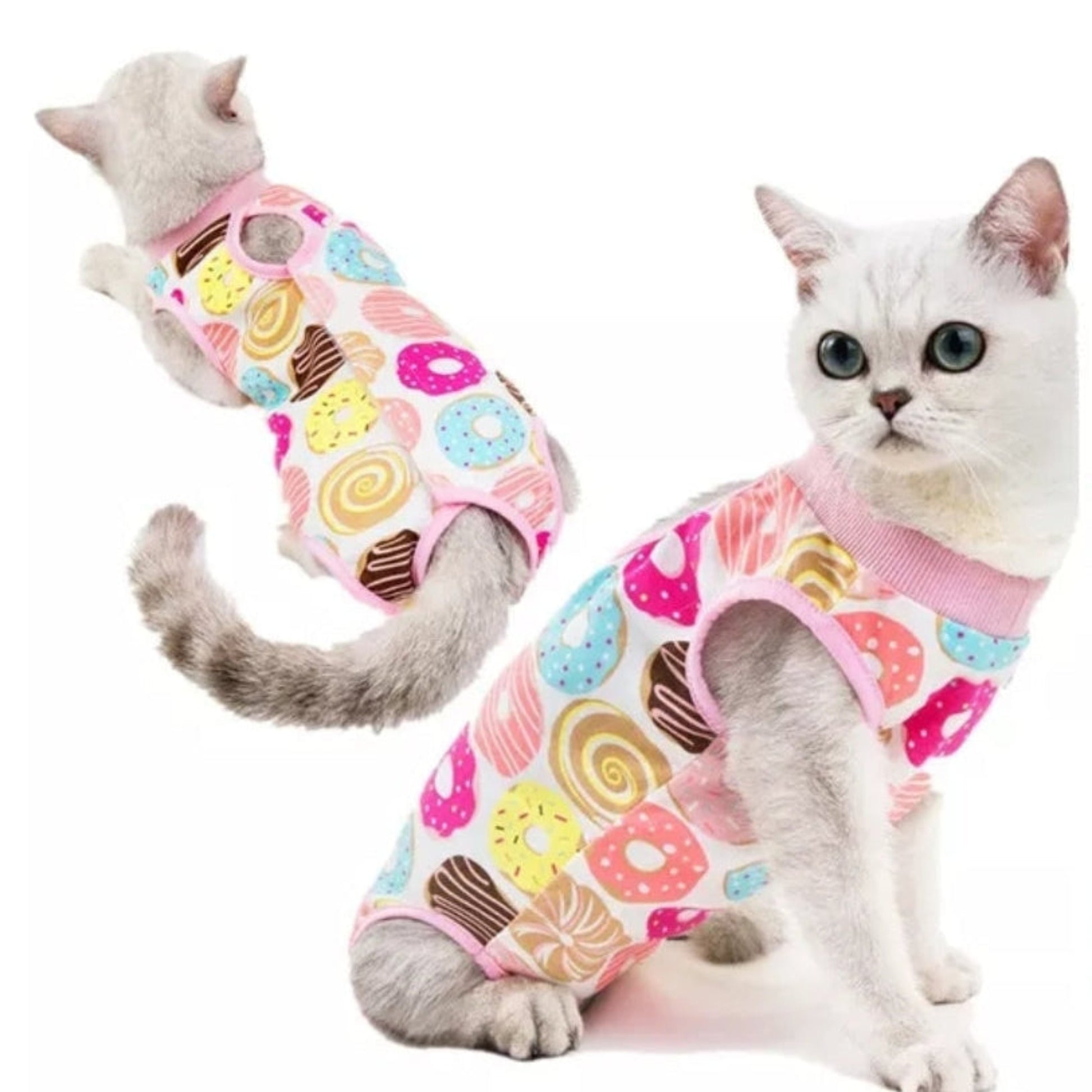 Two cats wearing colorful donut-patterned recovery suits on a white background