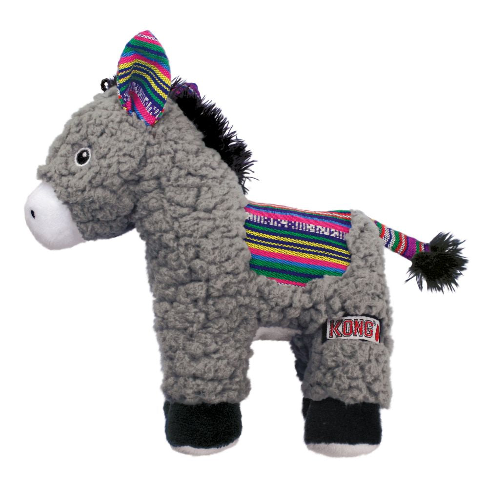 A KONG Sherps Donkey with a colorful striped blanket and a squeaker in its back, primarily gray in color.