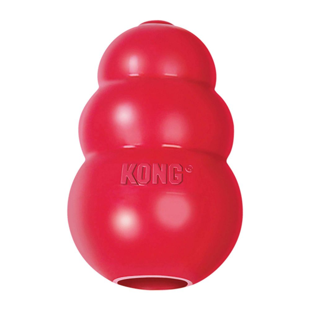 A red KONG Classic dog toy made of natural rubber, designed for chewing and playing fetch.