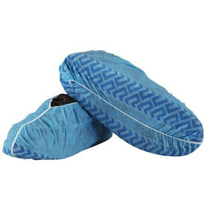 A pair of blue shoe covers with a non-slip sole, featuring a geometric pattern.
