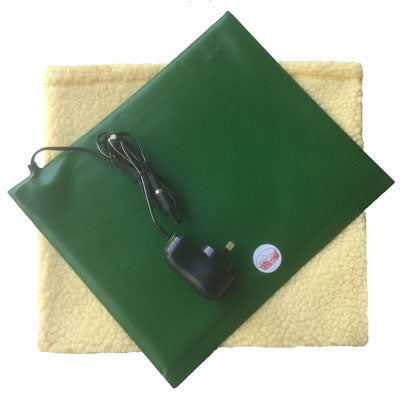 A small green Warm.A.Pet Heat Pad with a yellow sherpa cover, including a power supply cord with a plug.